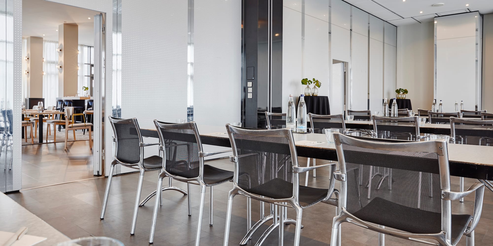 a room with tables and chairs