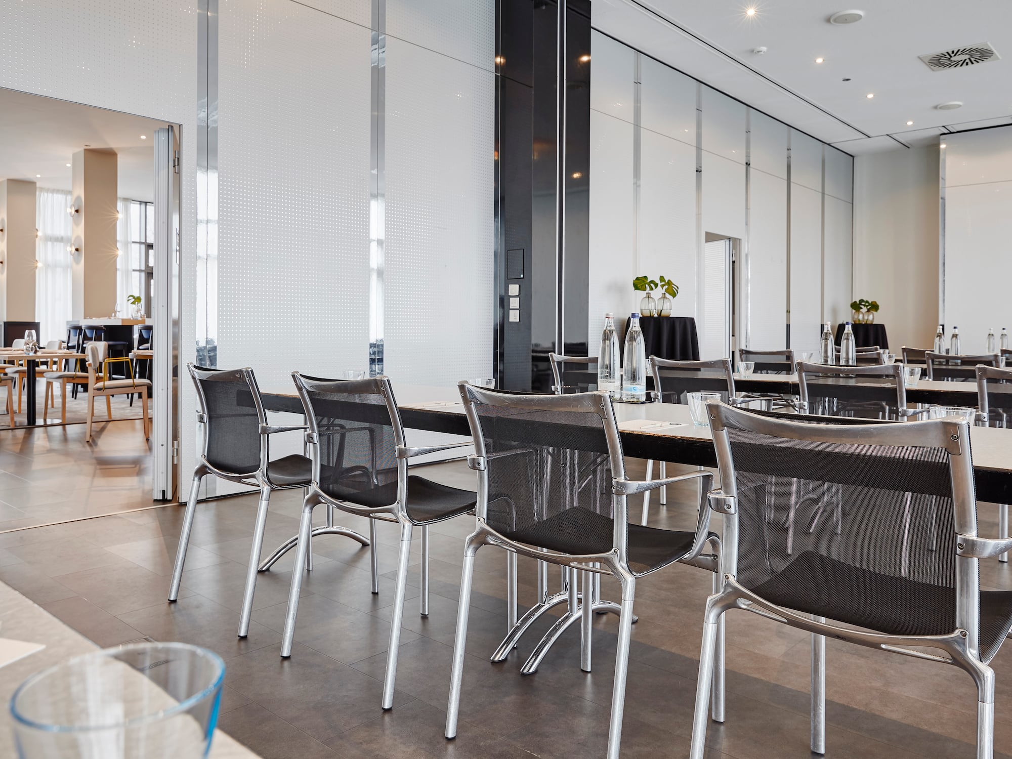 a room with tables and chairs