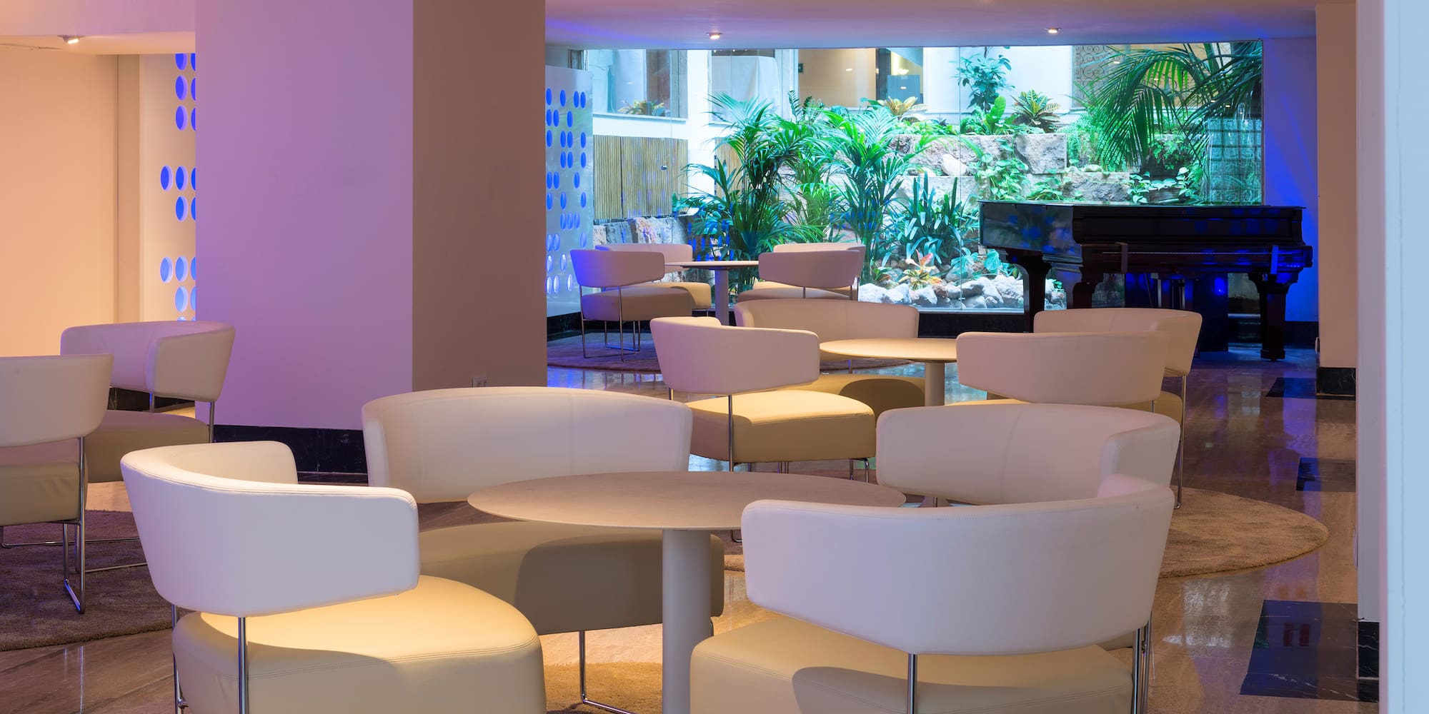 a room with tables and chairs