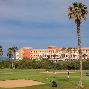 a group of people on a golf course