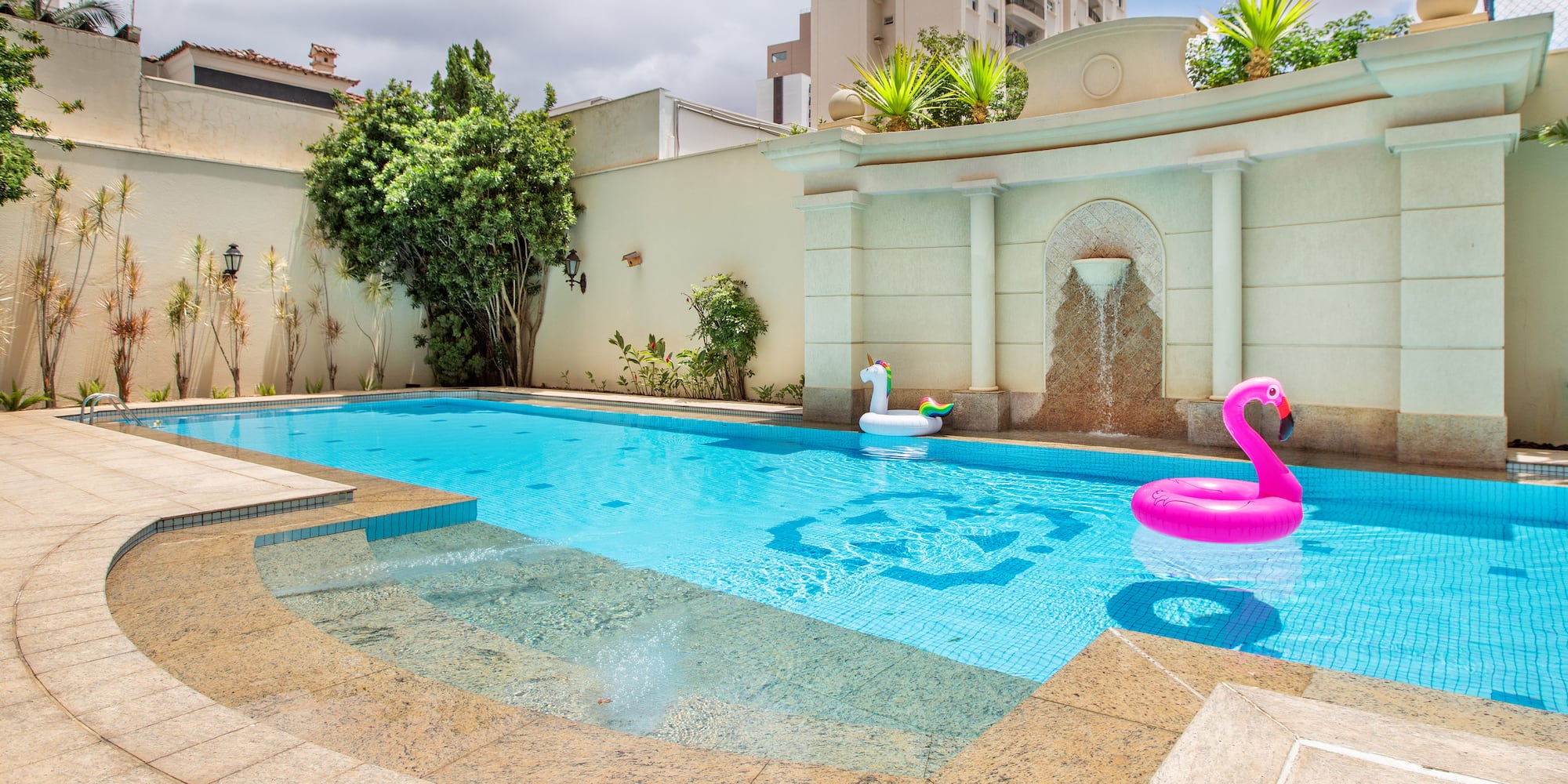 a pool with a pink float in it