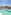 Rooftop swimming pool with city view, white stairs, and lounge area under blue sky.