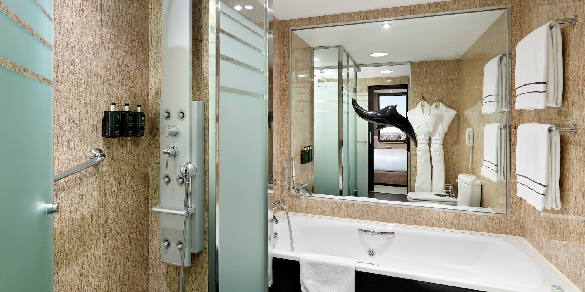 a bathroom with a shower and bathtub