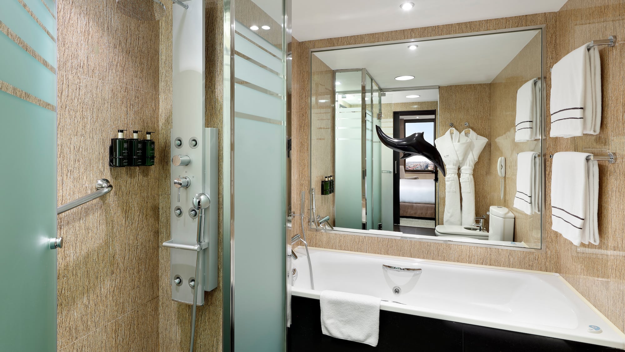 a bathroom with a shower and bathtub