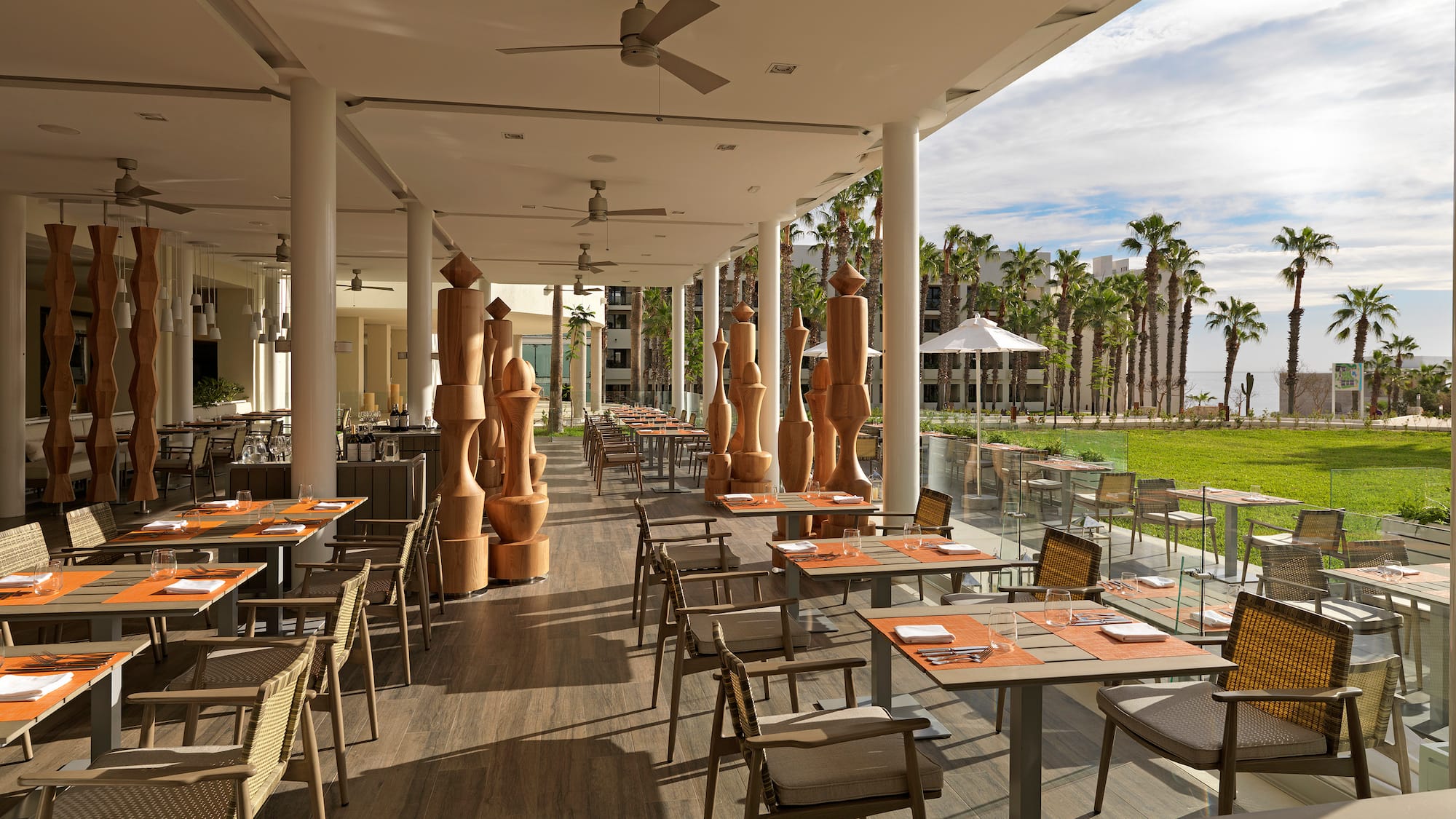 a restaurant with tables and chairs