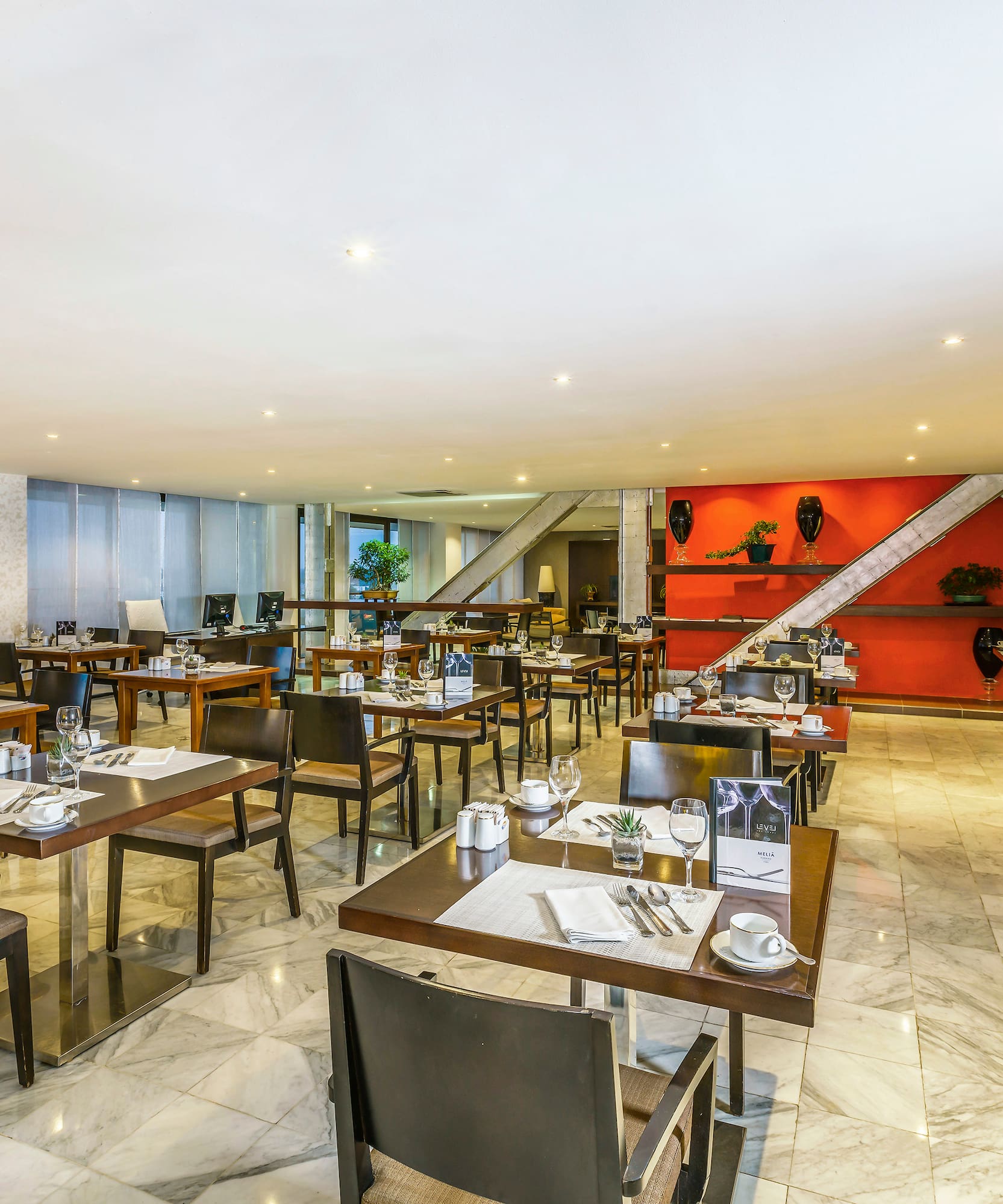 a room with tables and chairs