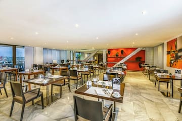 a room with tables and chairs