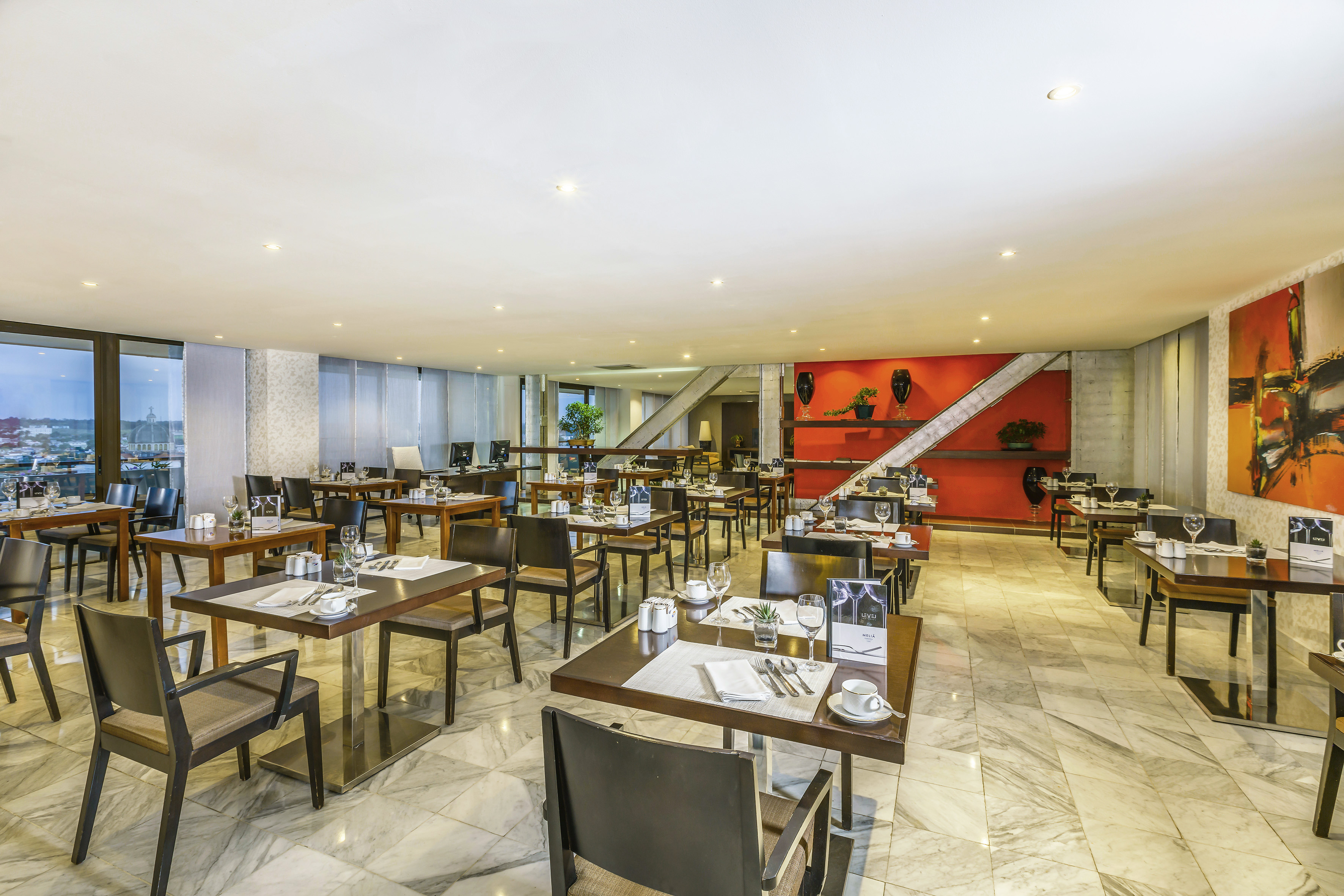 a room with tables and chairs