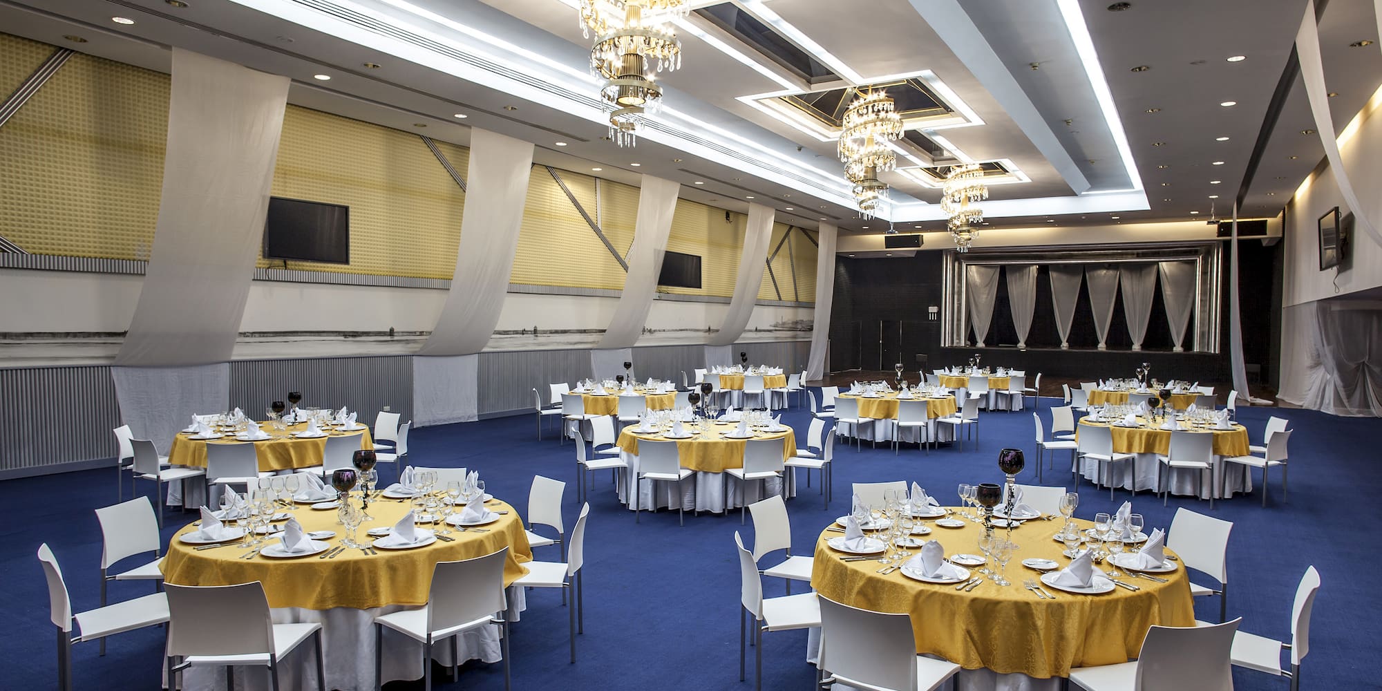 a room with tables and chairs