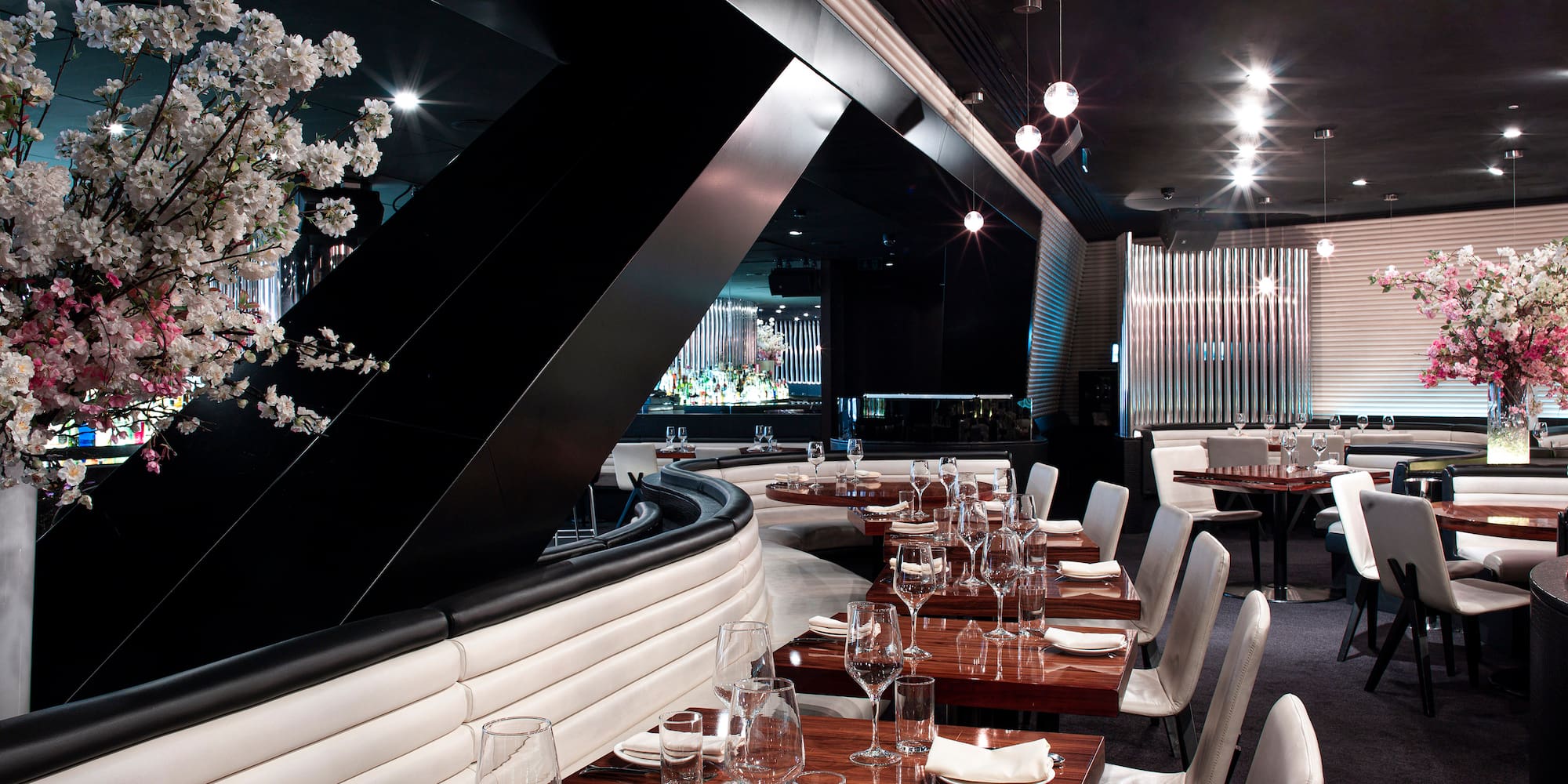 a restaurant with tables and chairs