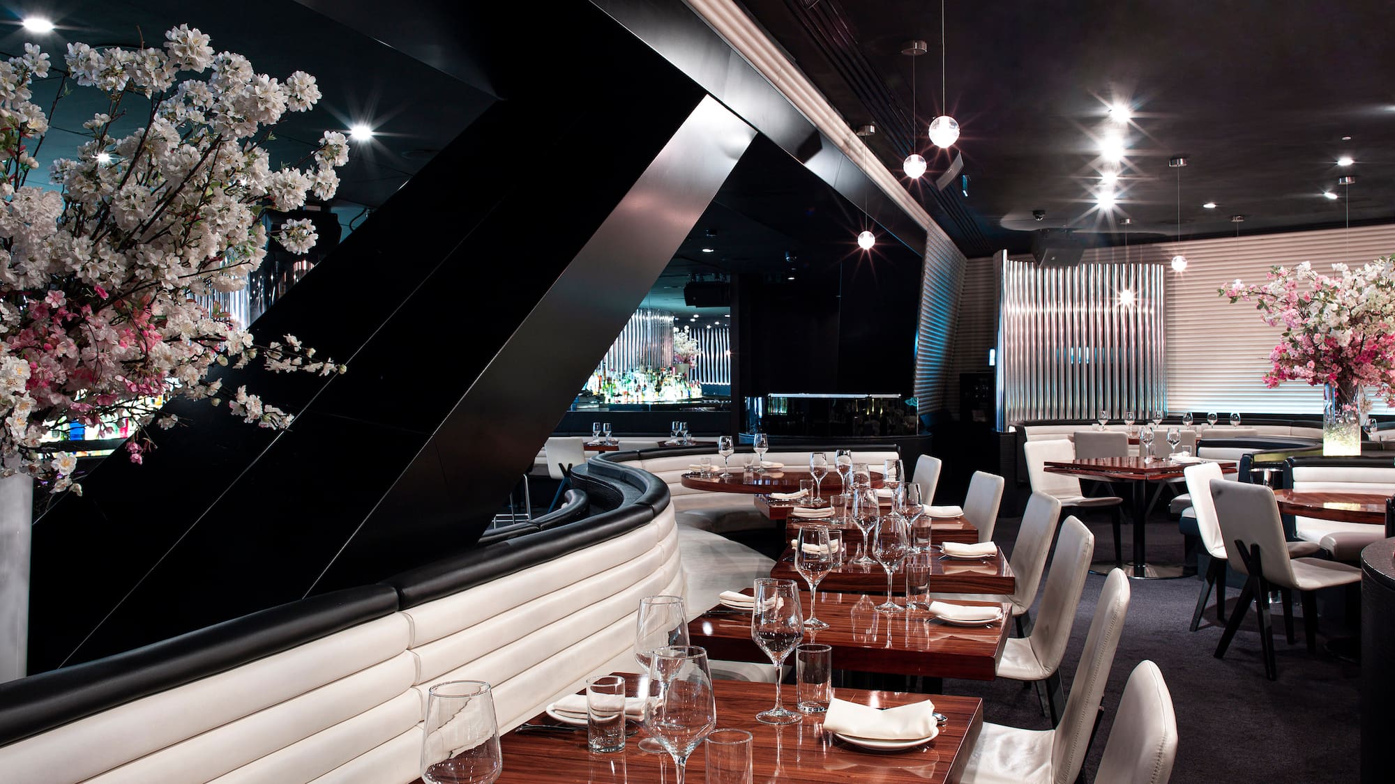 a restaurant with tables and chairs