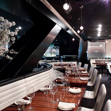 a restaurant with tables and chairs