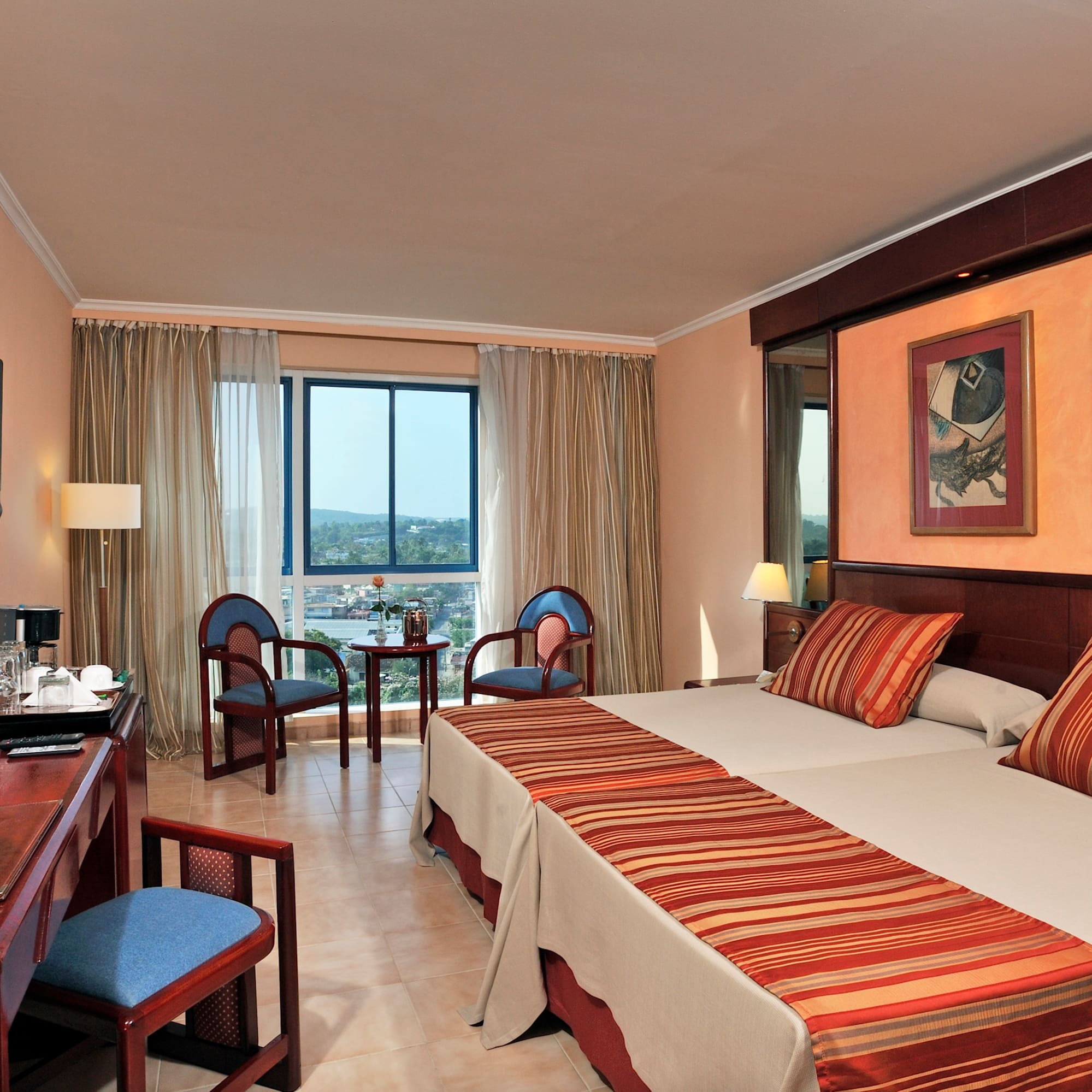 a room with a bed and a desk