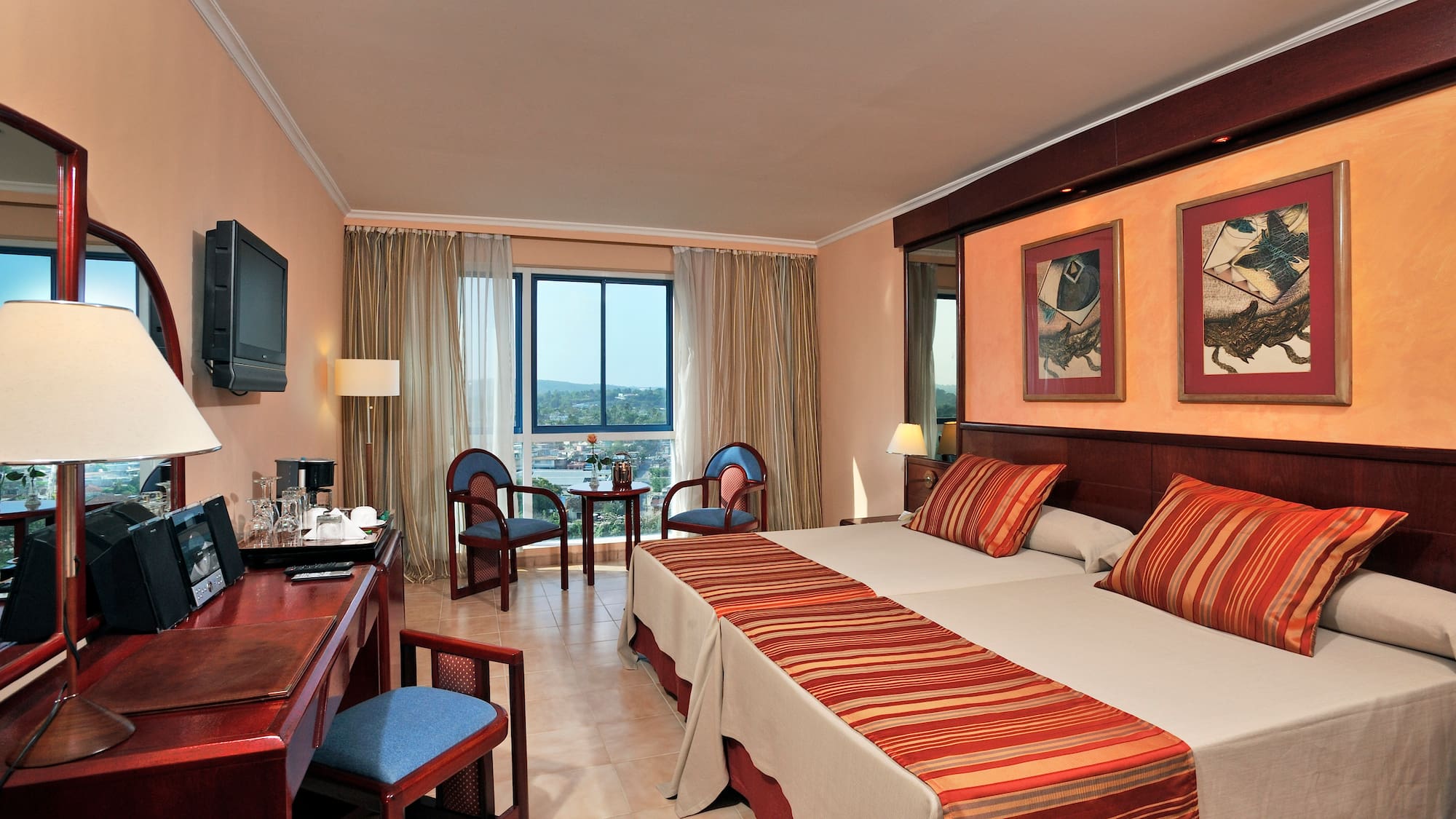 a room with a bed and a desk