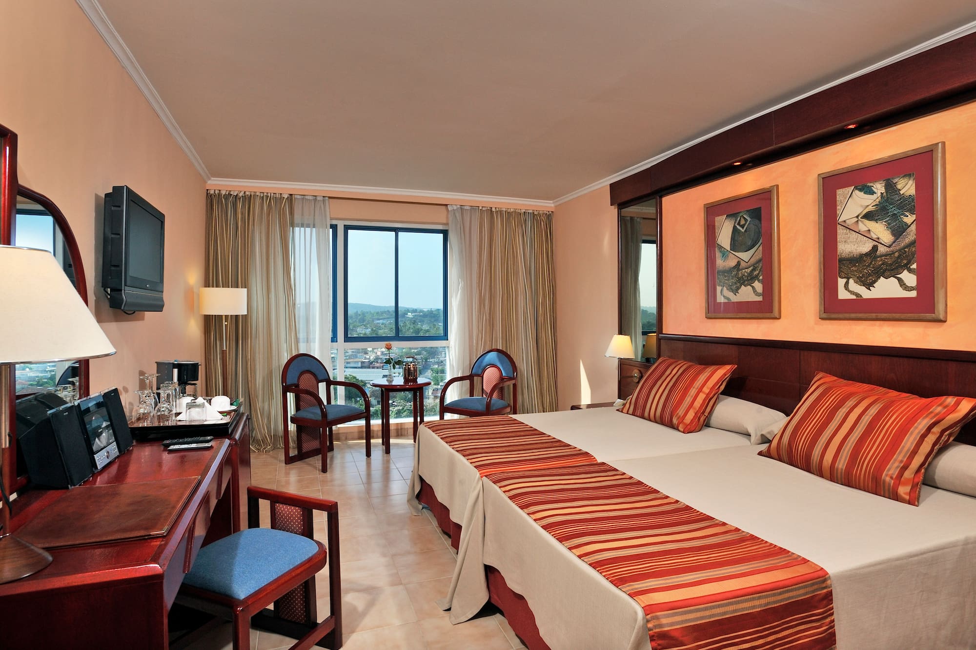 a room with a bed and a desk