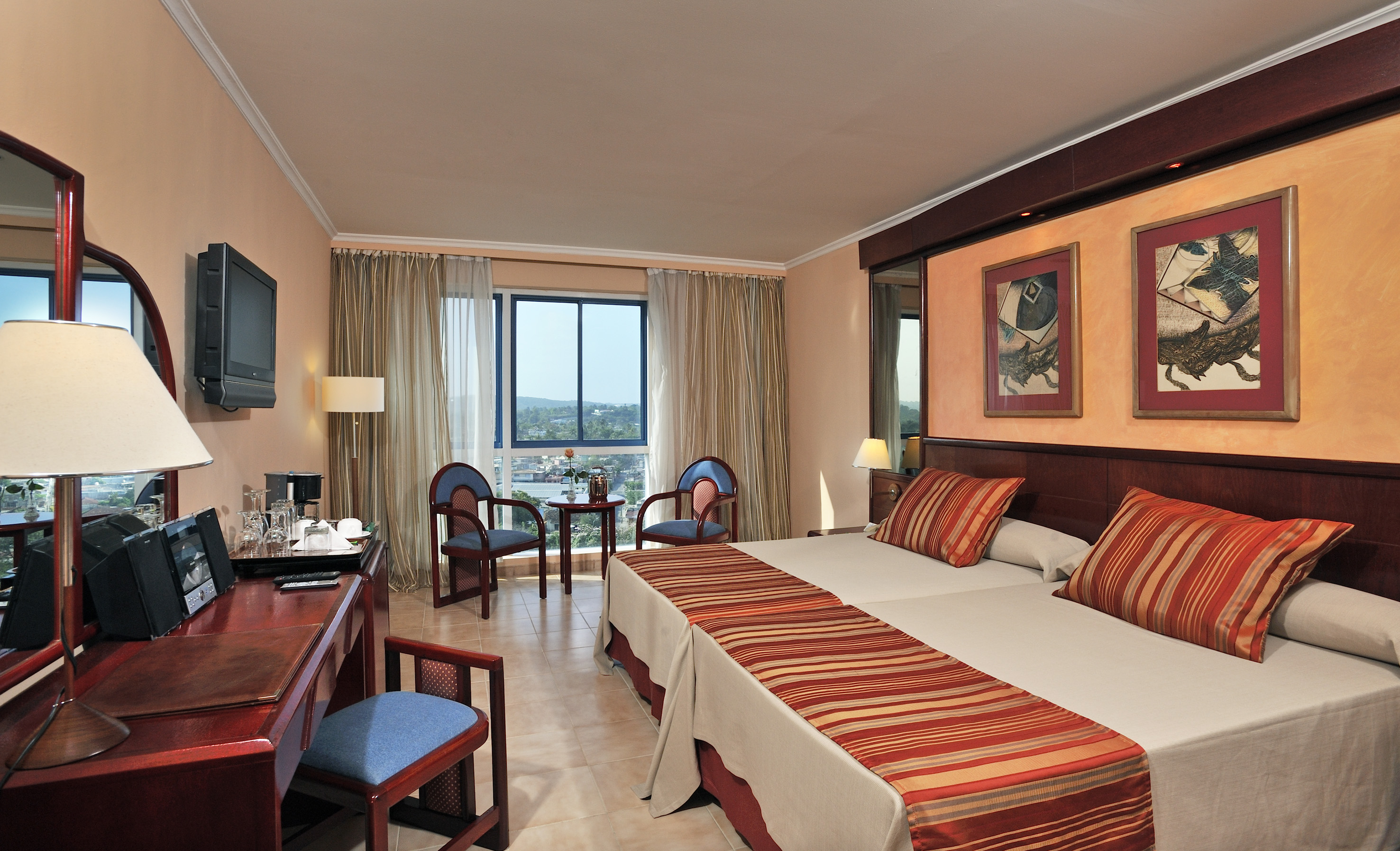 a room with a bed and a desk