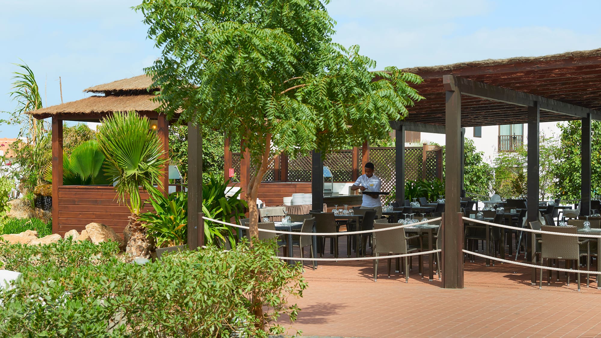 a man standing at a table