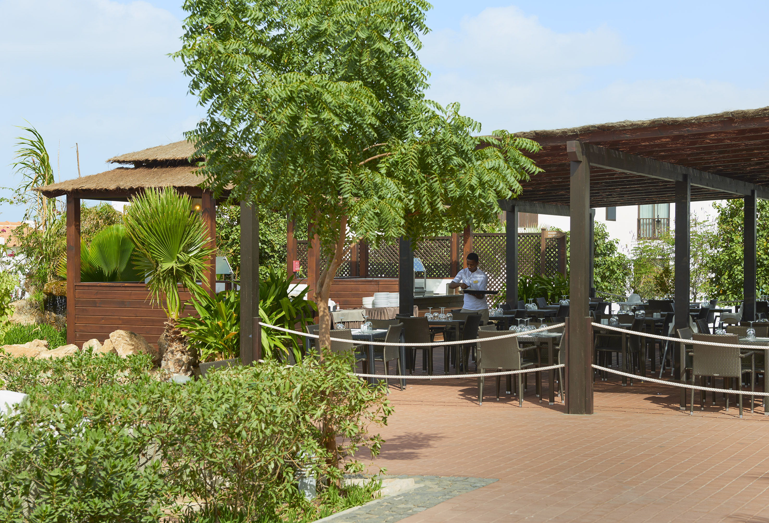 a man standing at a table