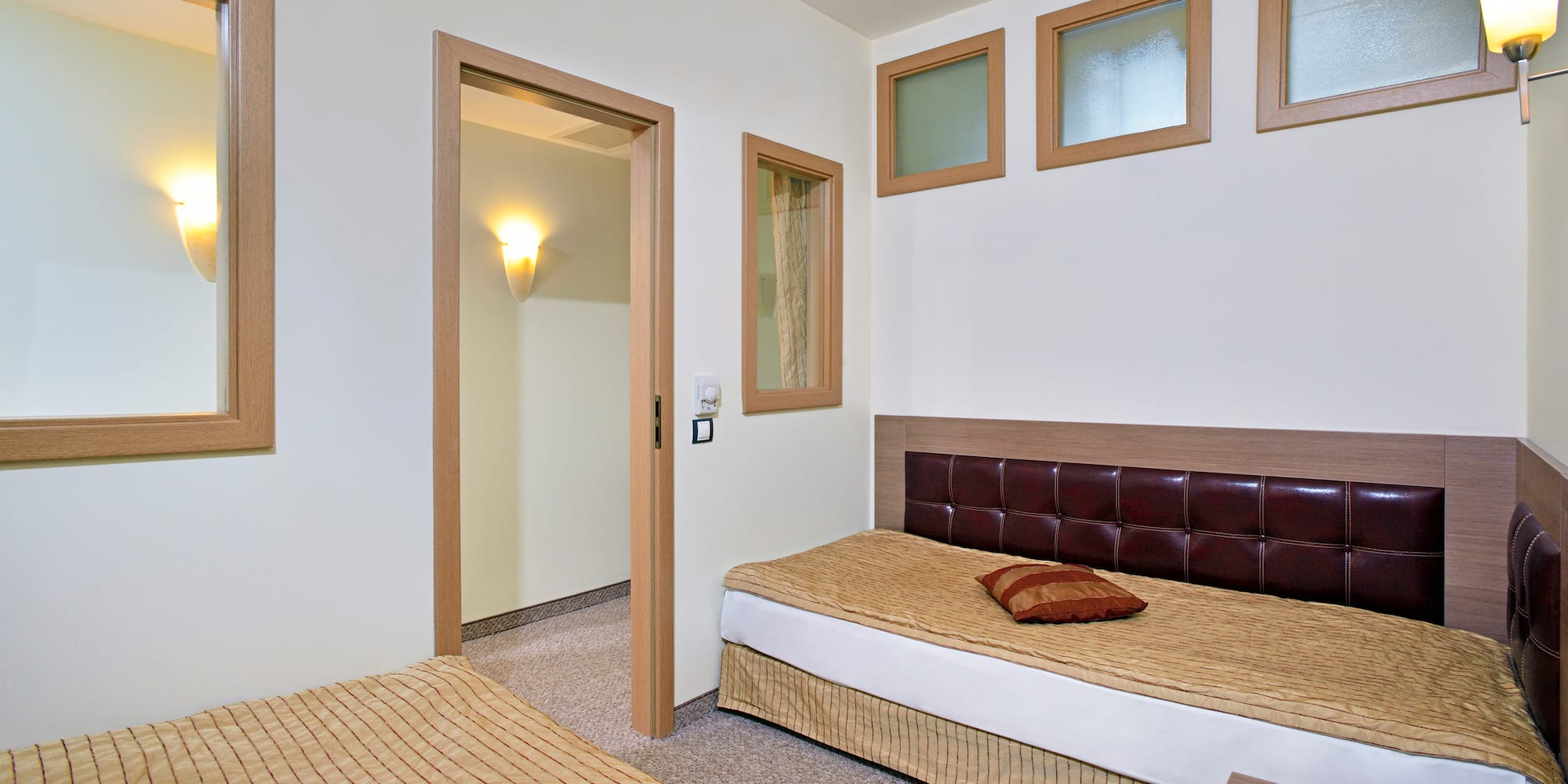 a bedroom with a bed and a door