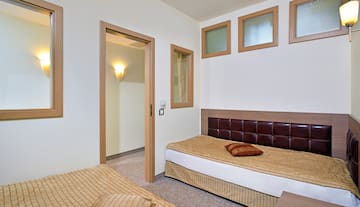 a bedroom with a bed and a door