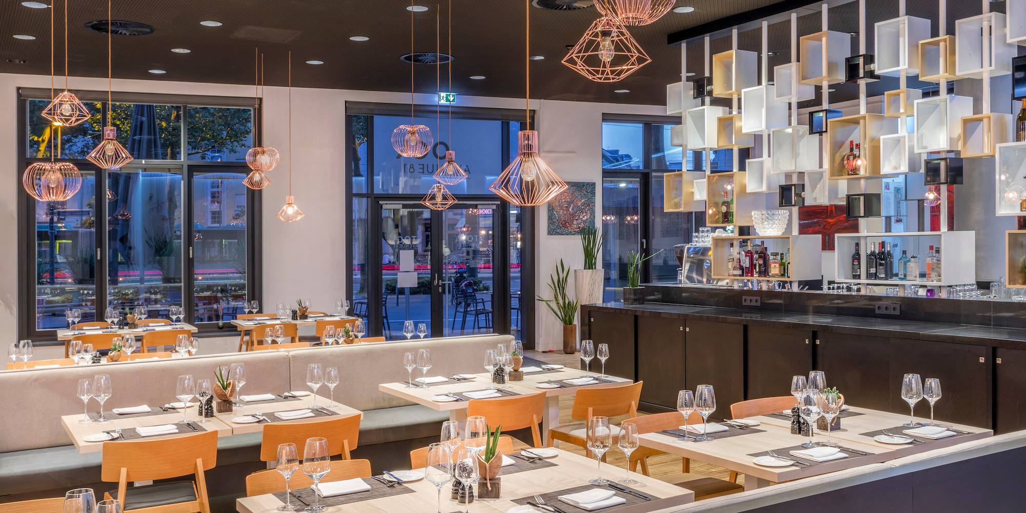 a restaurant with tables and chairs