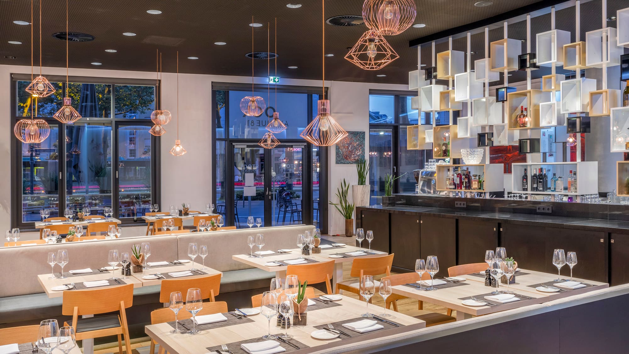 a restaurant with tables and chairs