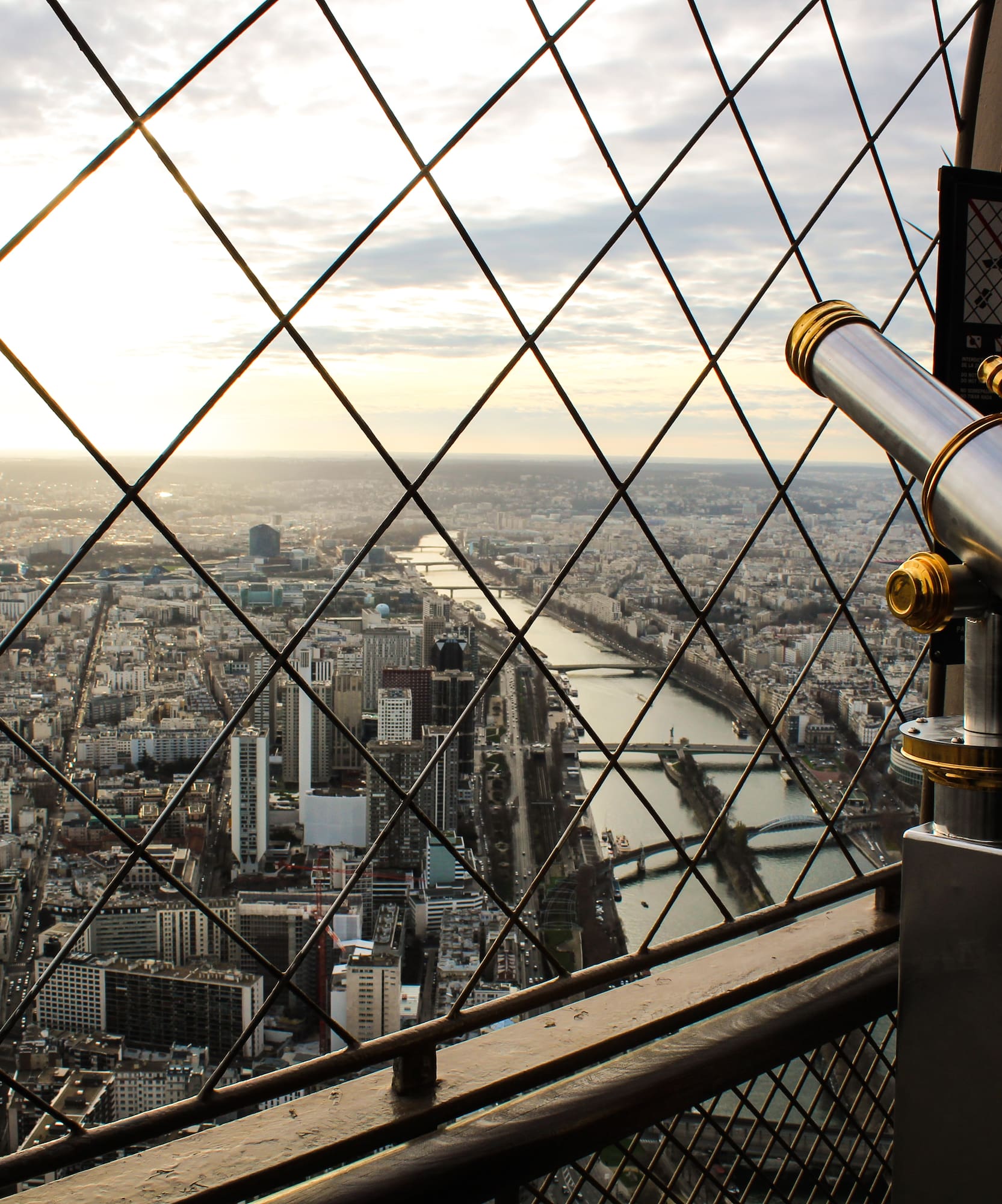 a telescope looking out a city
