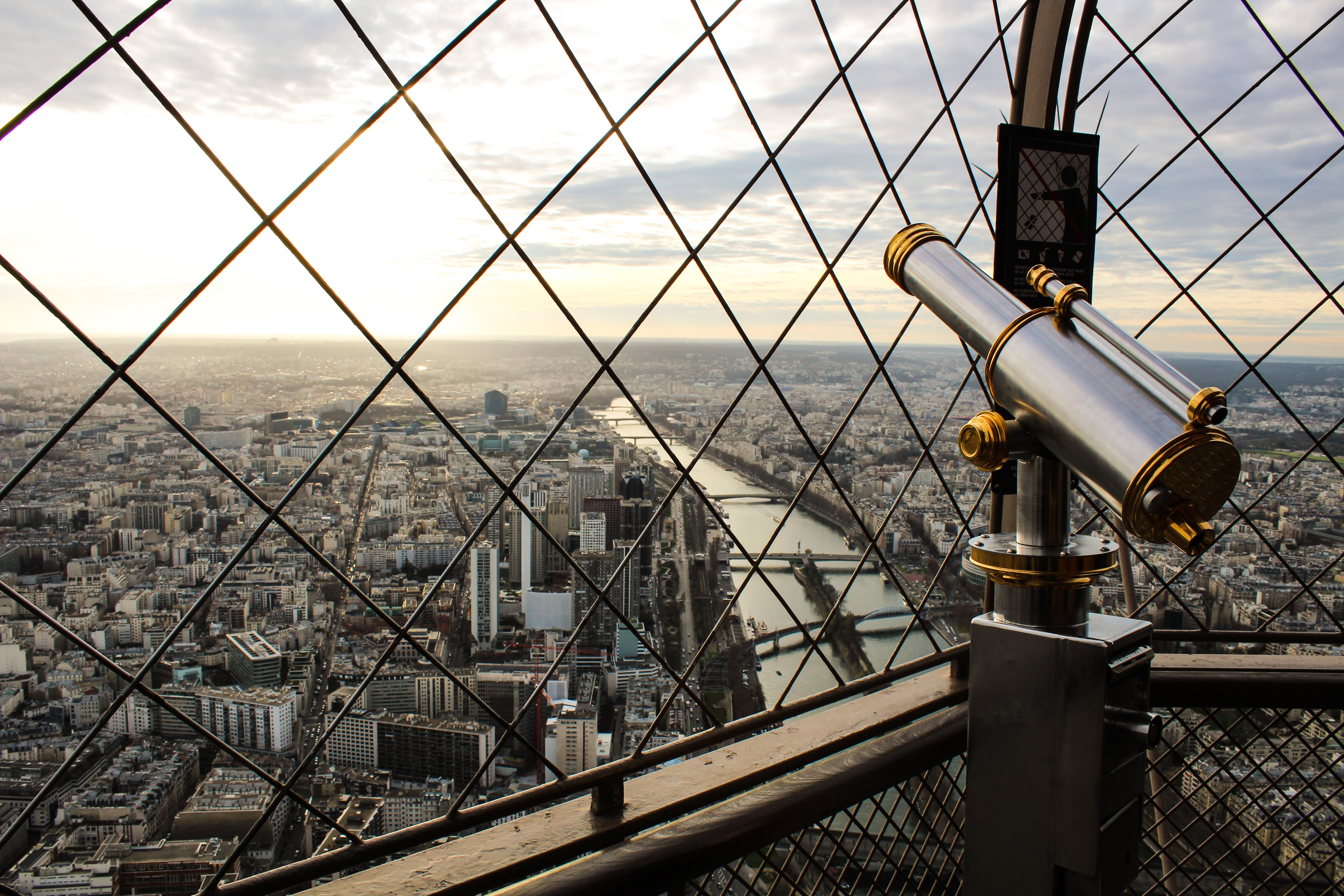a telescope looking out a city