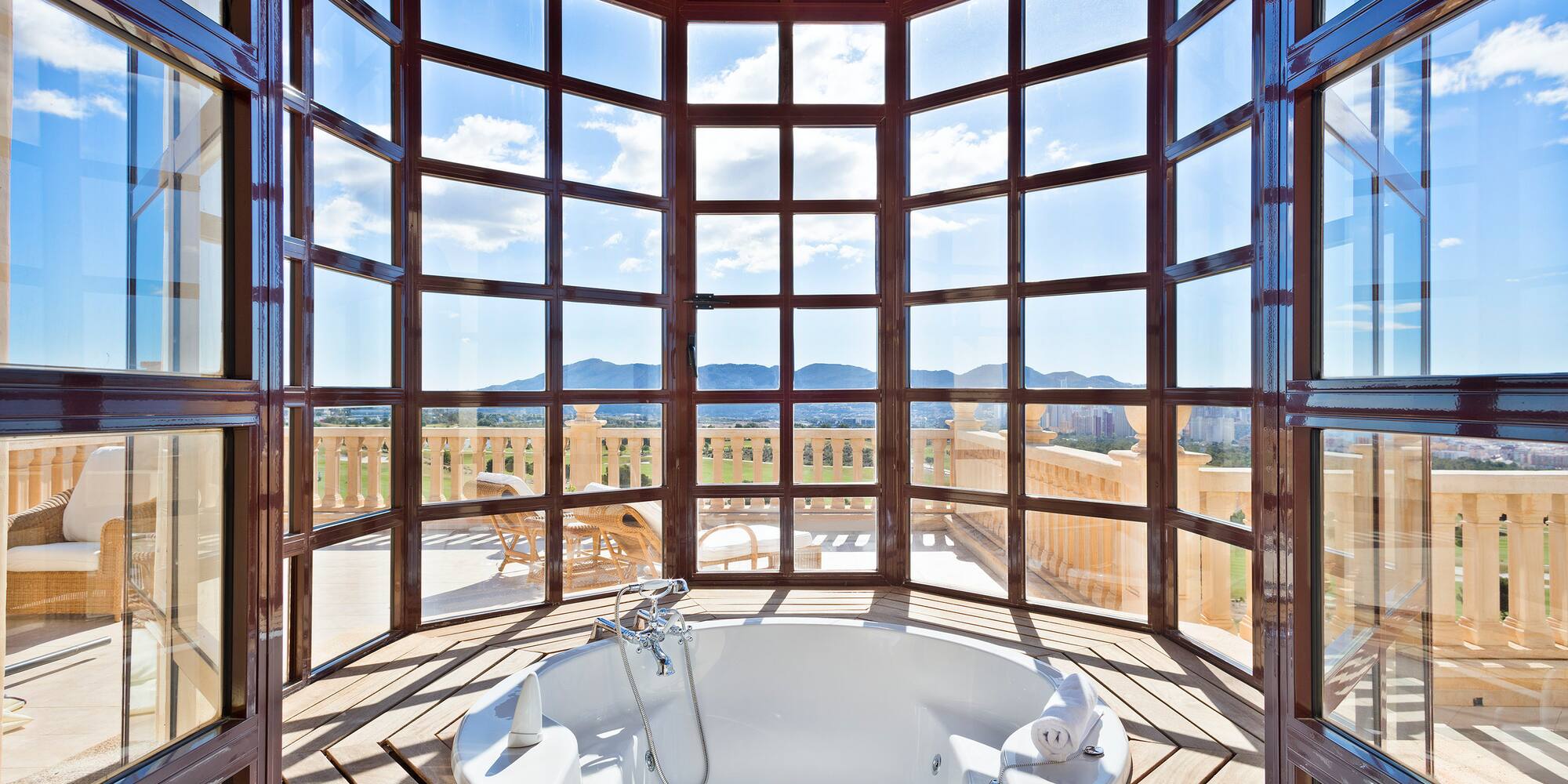 a large round tub with a window