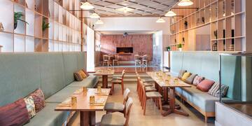 a room with tables and chairs