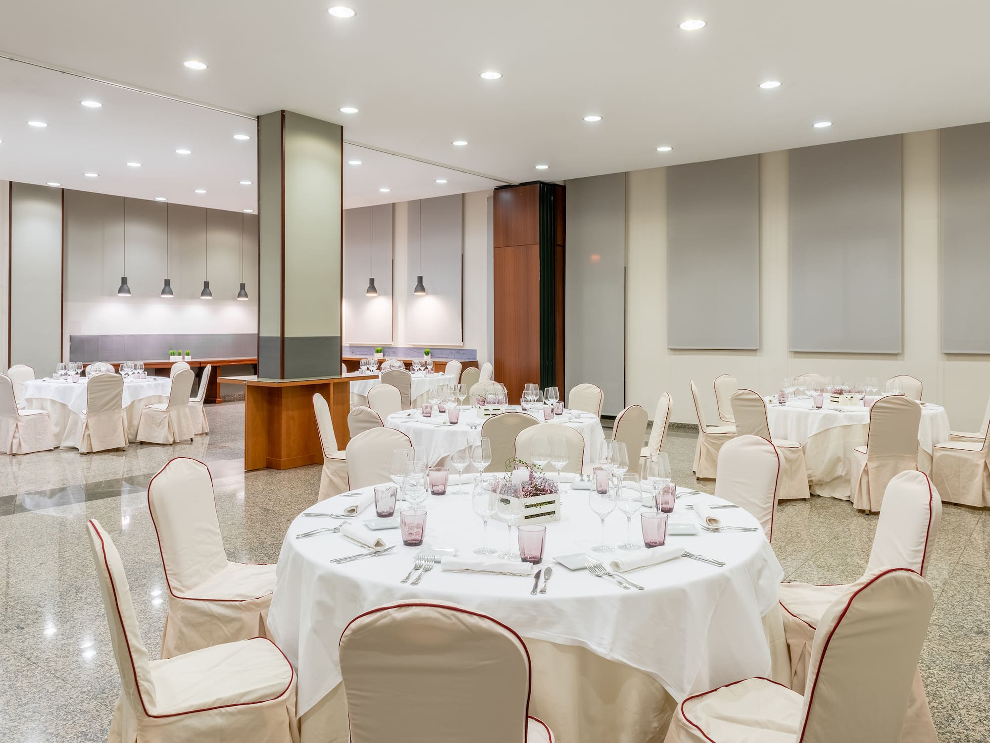 a room with tables and chairs