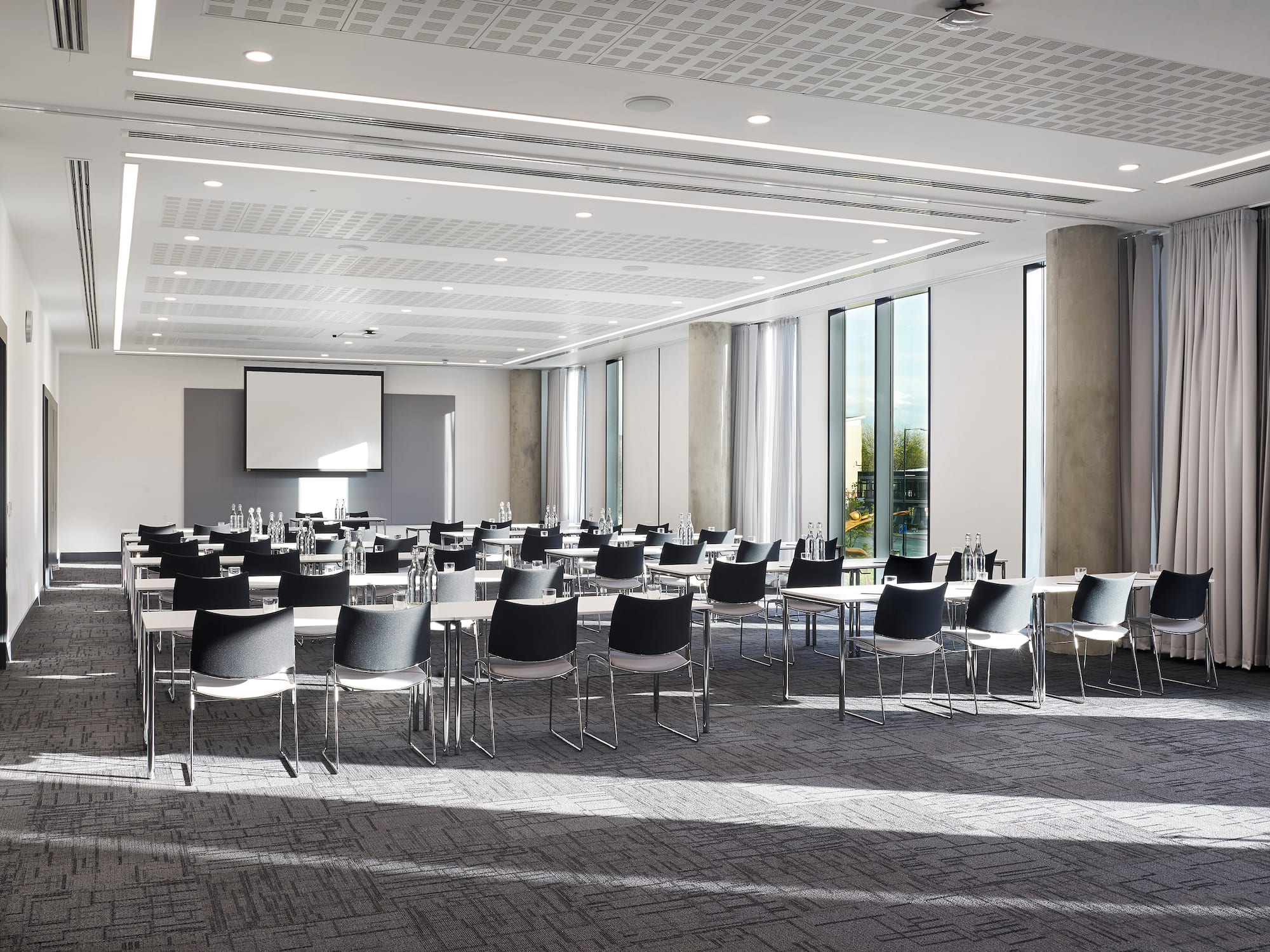 a room with tables and chairs