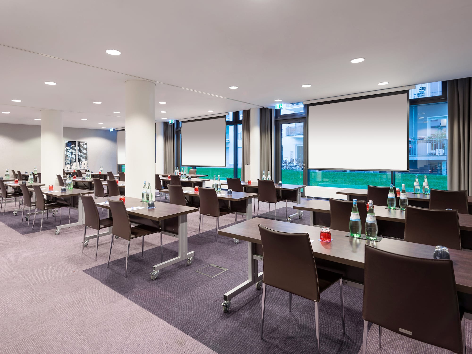 a room with tables and chairs