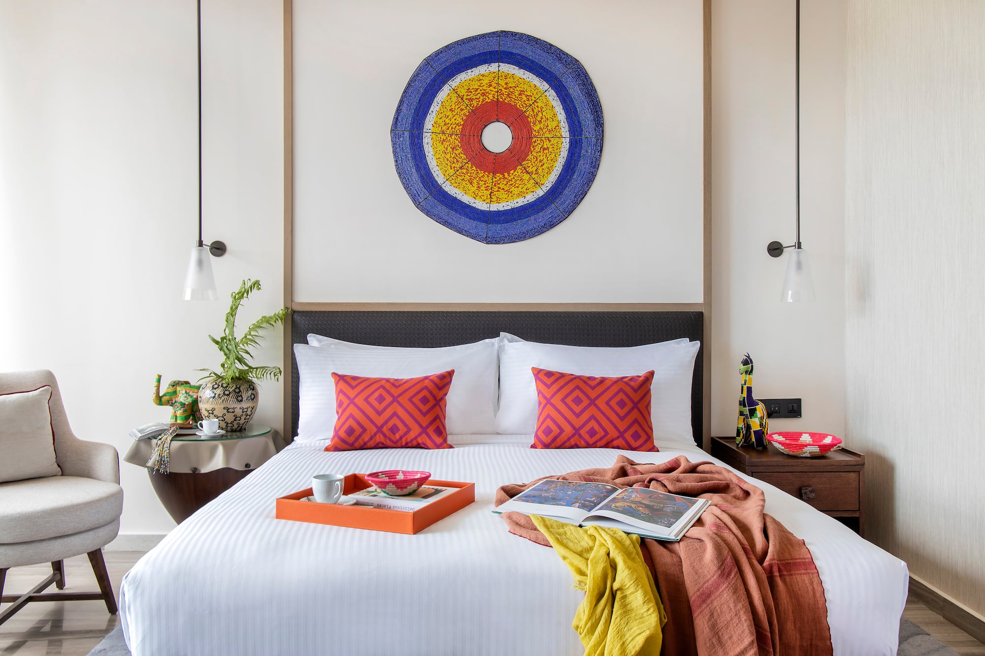 a bed with a tray of food on it