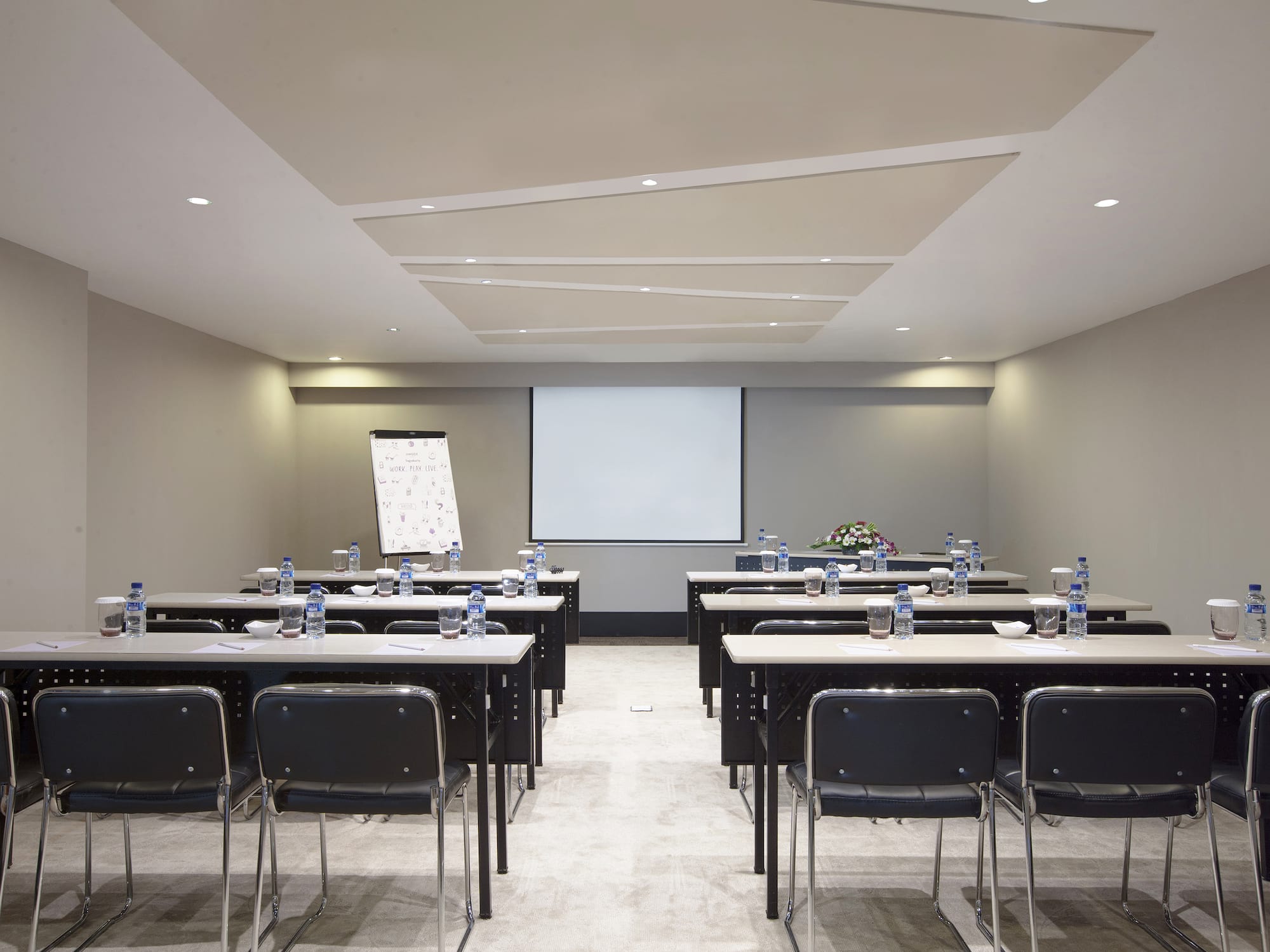 a room with tables and chairs