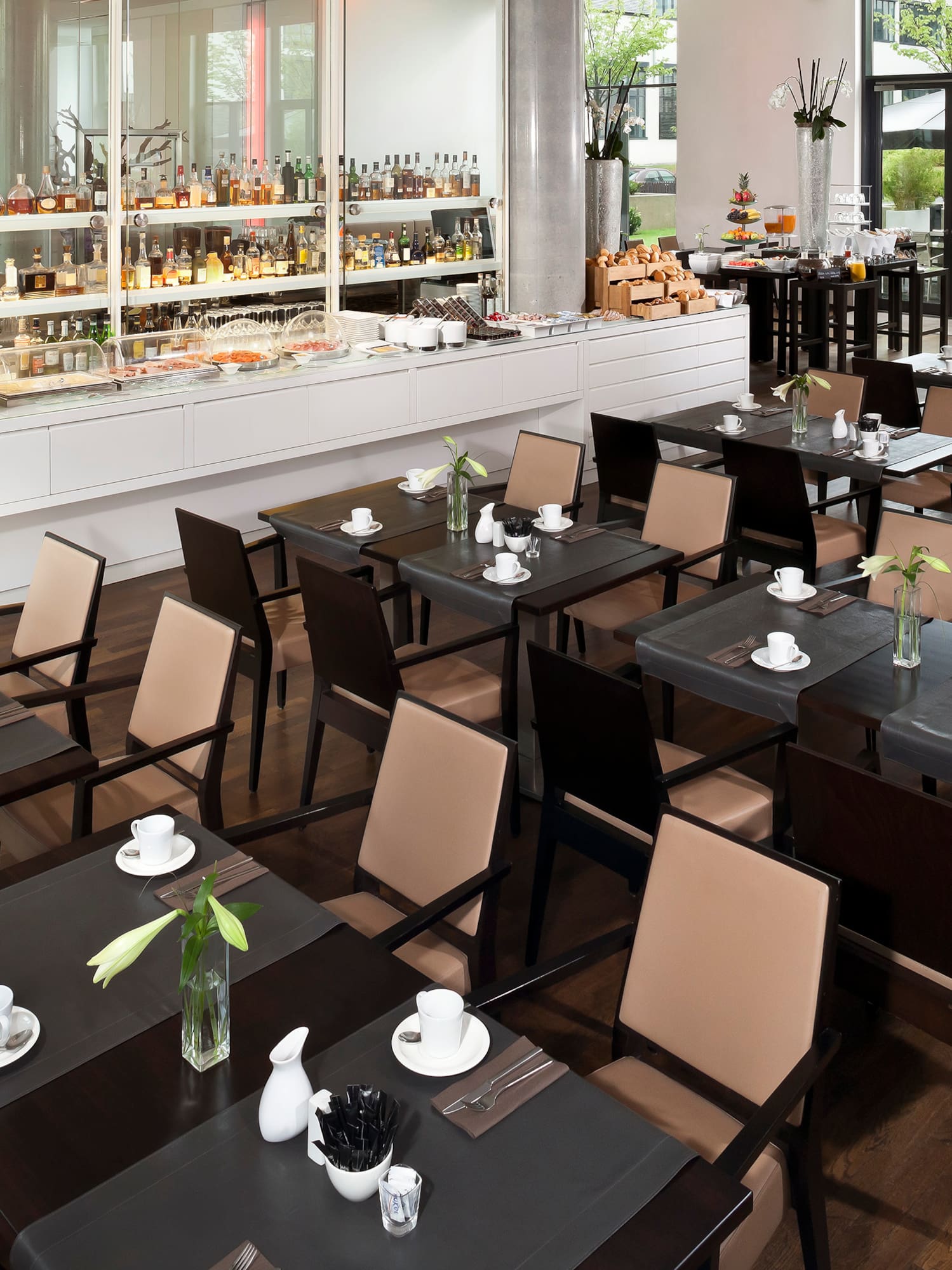 a restaurant with tables and chairs