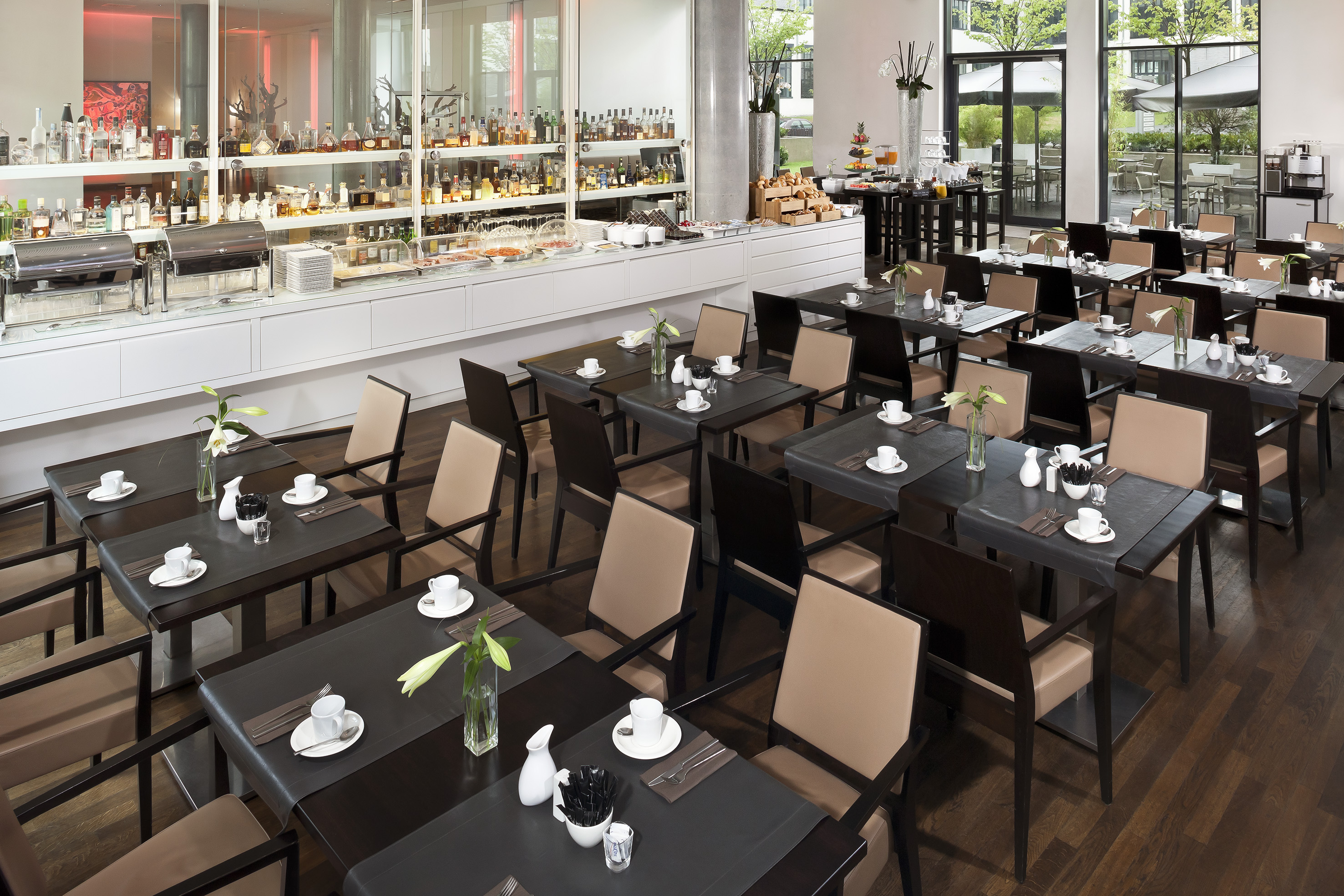 a restaurant with tables and chairs