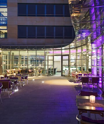 a building with tables and chairs