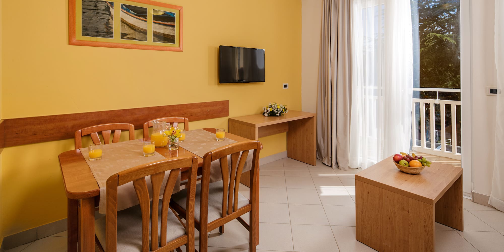 a room with a table and chairs