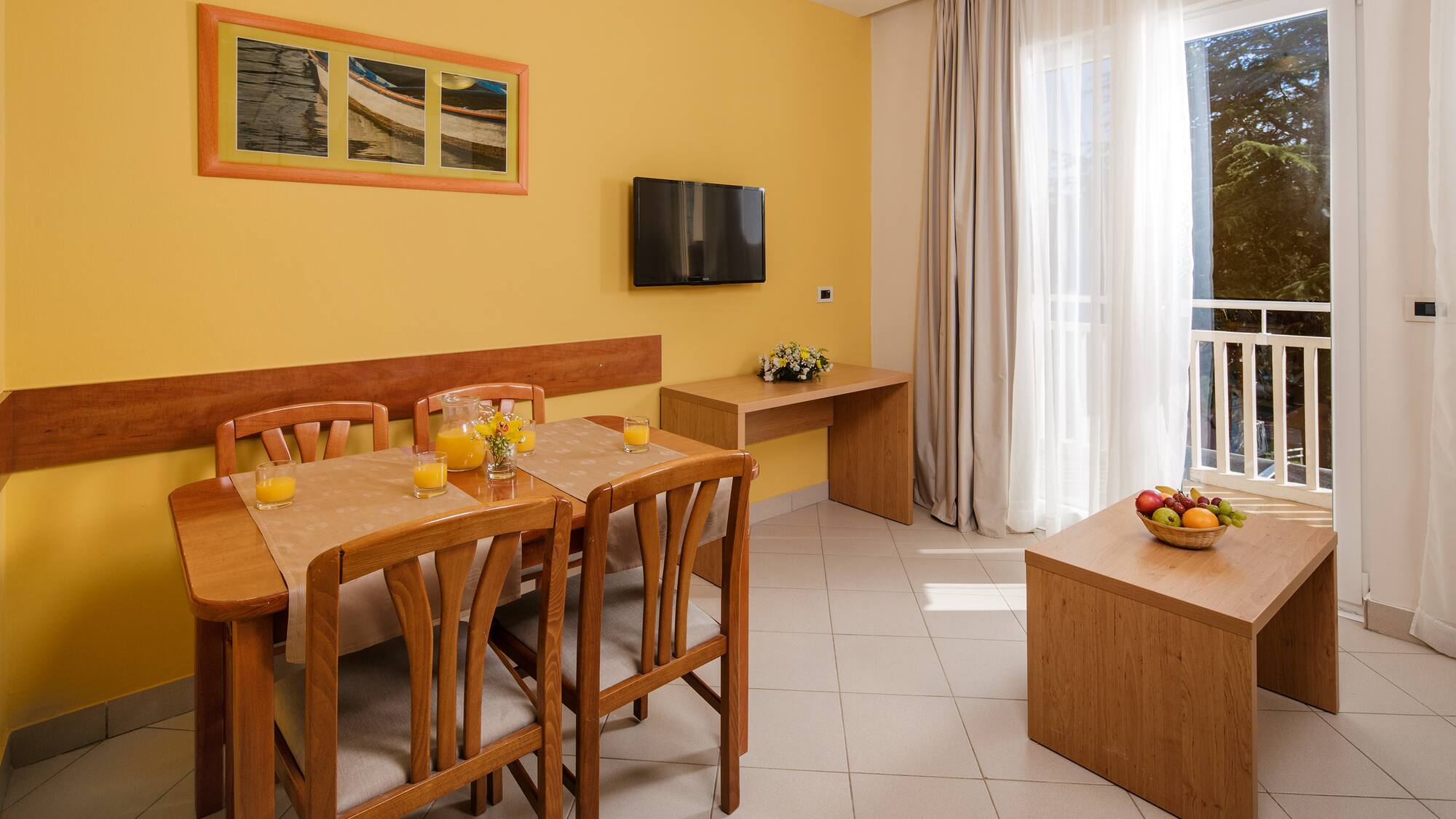 a room with a table and chairs