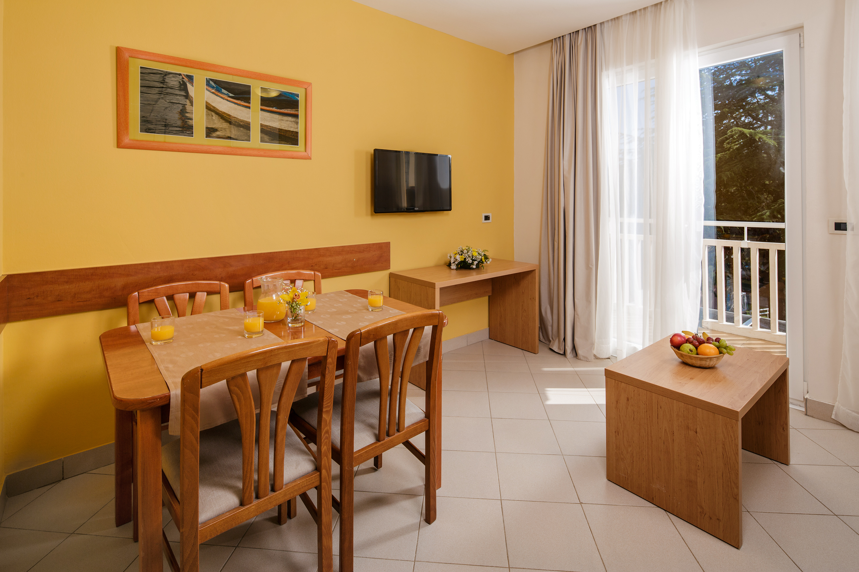 a room with a table and chairs