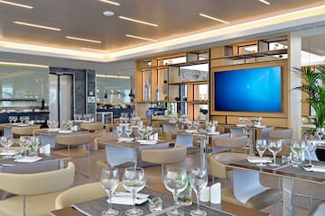 a room with tables and chairs