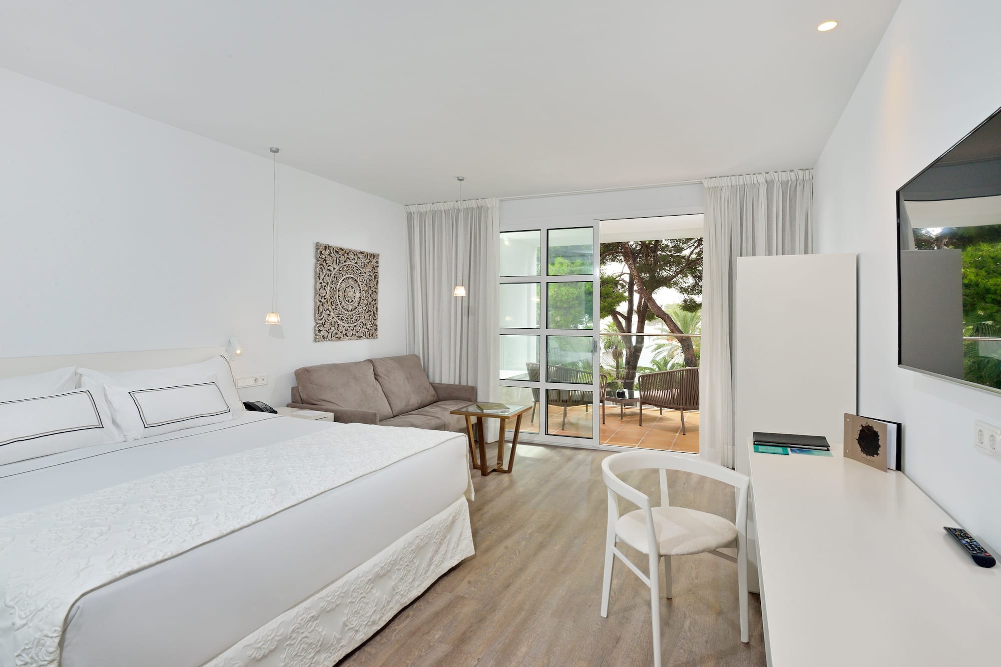 a room with a bed and a couch