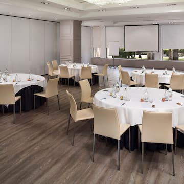 a room with tables and chairs