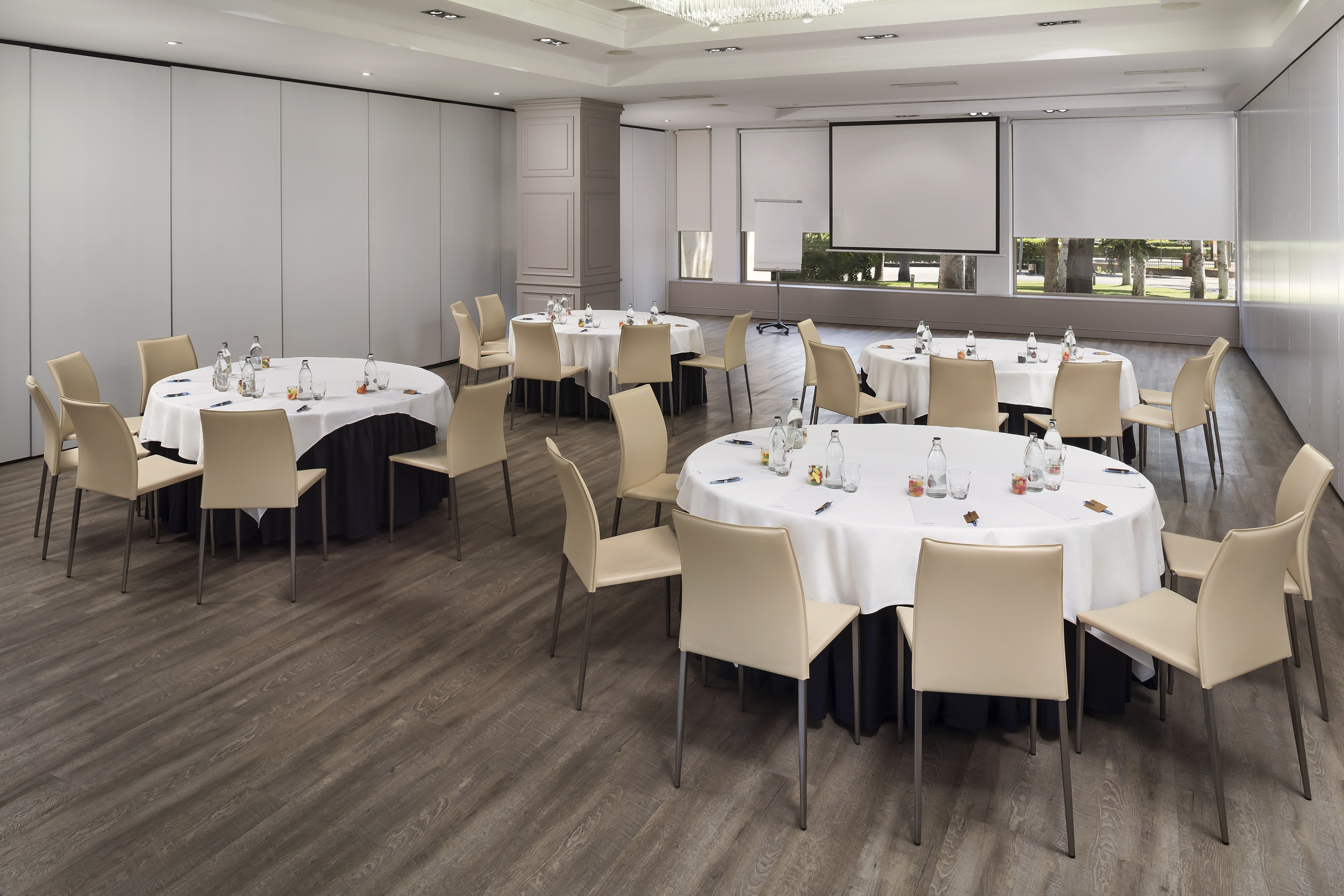 a room with tables and chairs