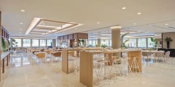 a room with tables and chairs