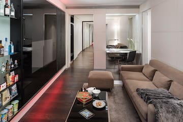 a living room with a couch and coffee table