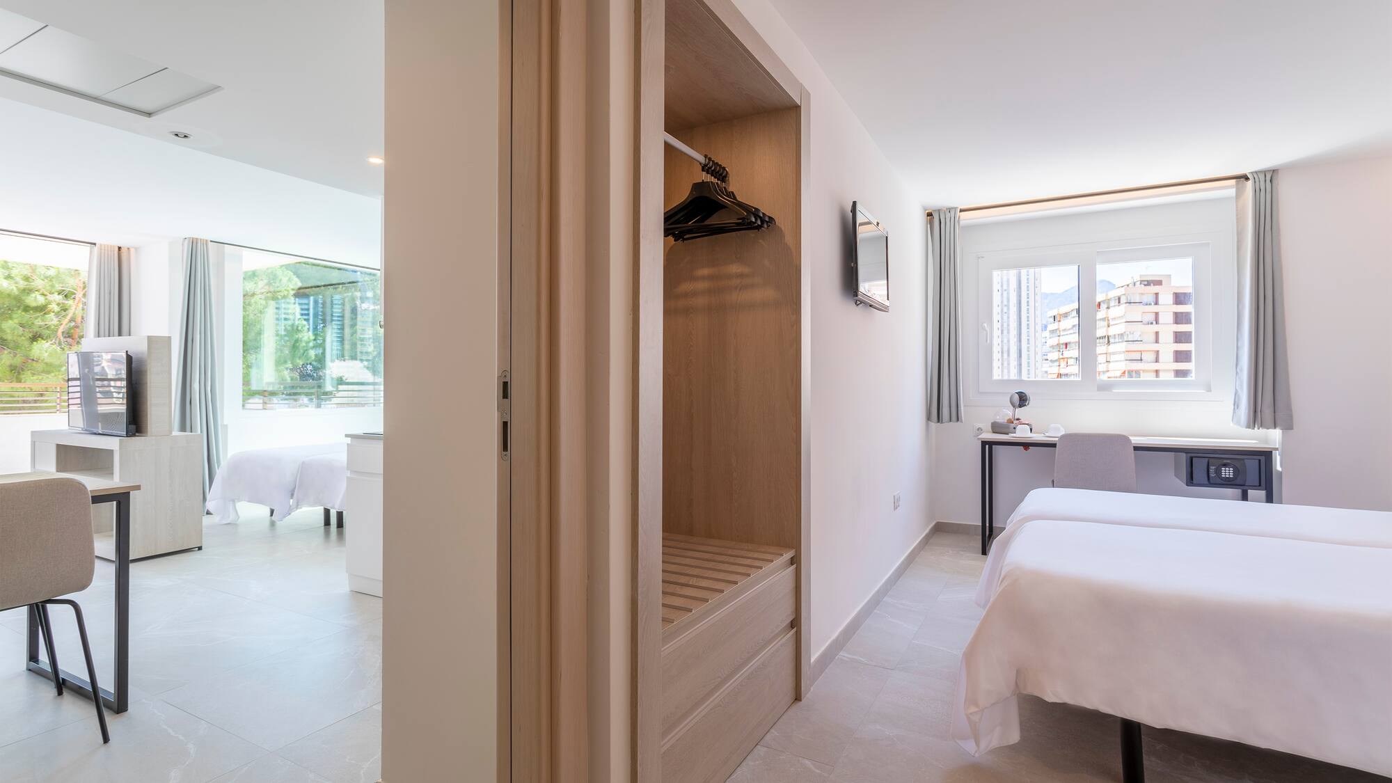 a room with a bed and a closet