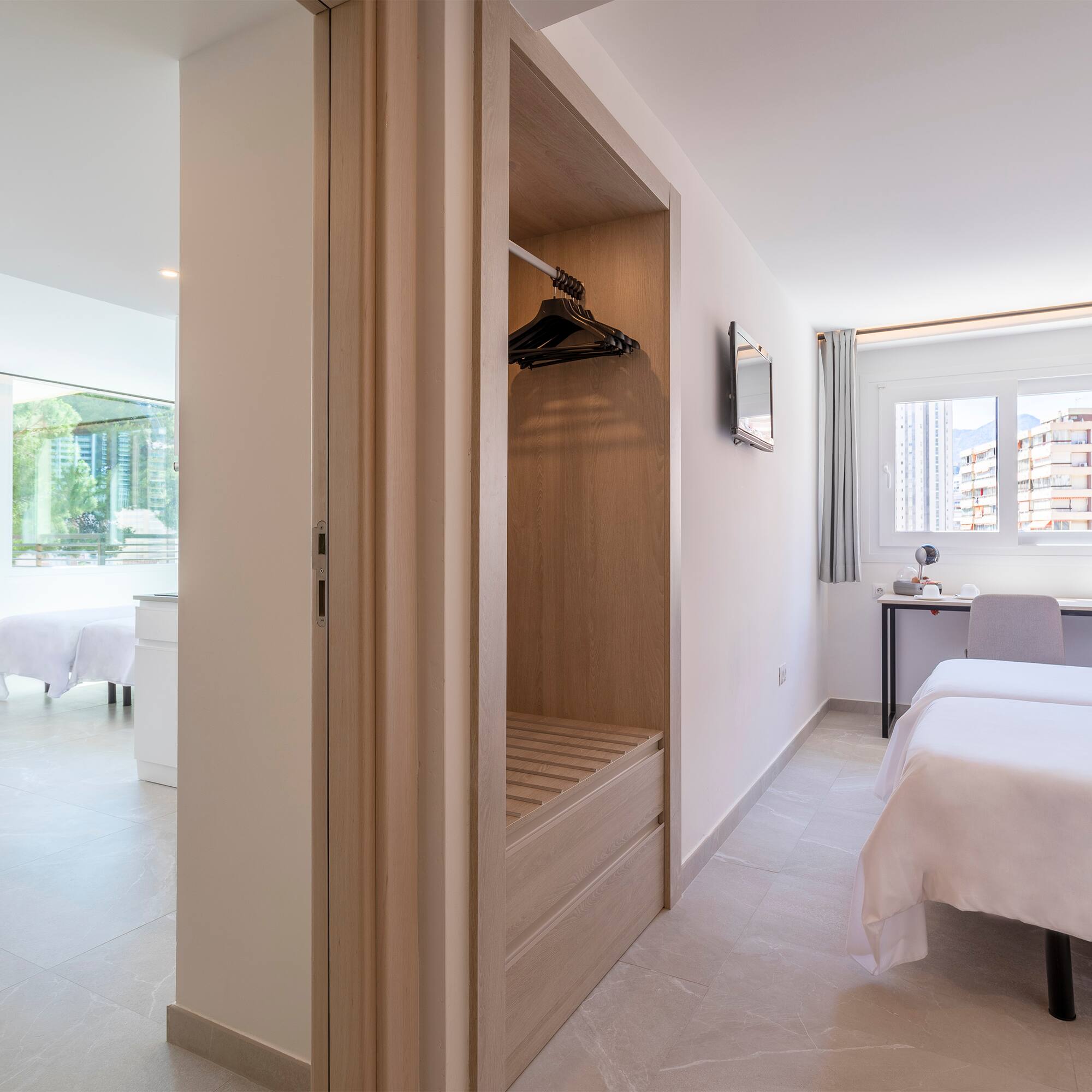 a room with a bed and a closet