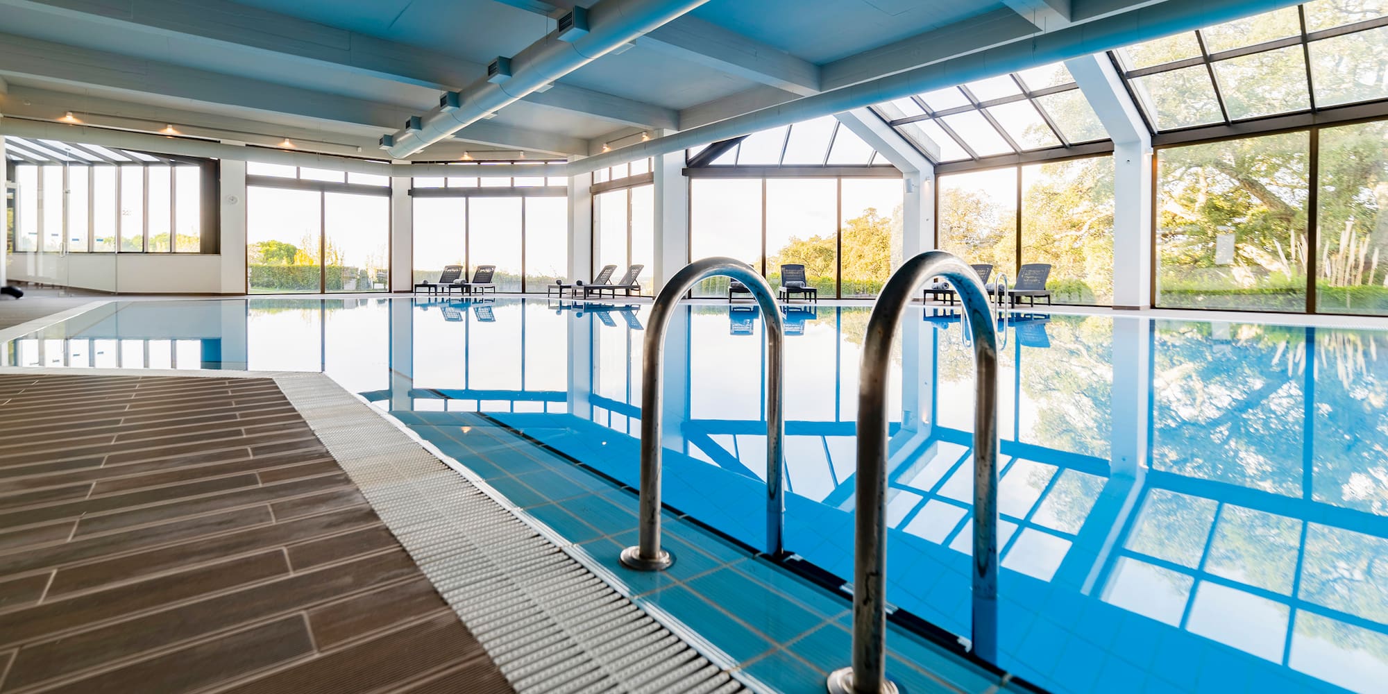 a swimming pool with a large window